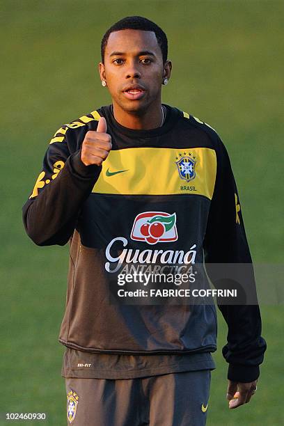 Brazil's striker Robinho gives a thump up during a training session at Randburg High School in Johannesburg on June 27, 2010 during the 2010 World...