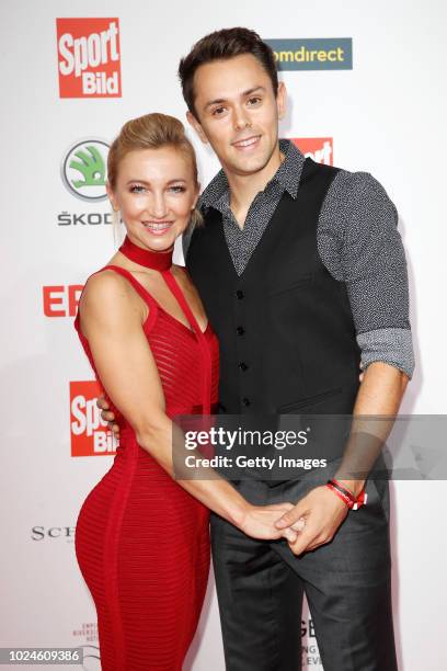 Figure skaters Aljona Savchenko and her husband Liam Cross attend the Sport Bild Award on August 27, 2018 in Hamburg, Germany.