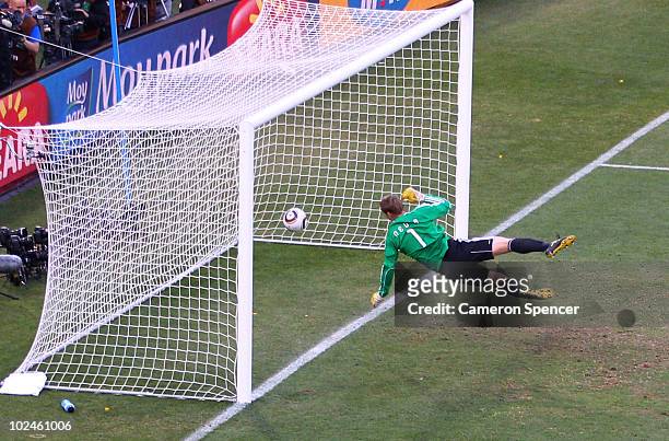Manuel Neuer of Germany watches the ball bounce over the line from a shot that hit the crossbar from Frank Lampard of England, but referee Jorge...