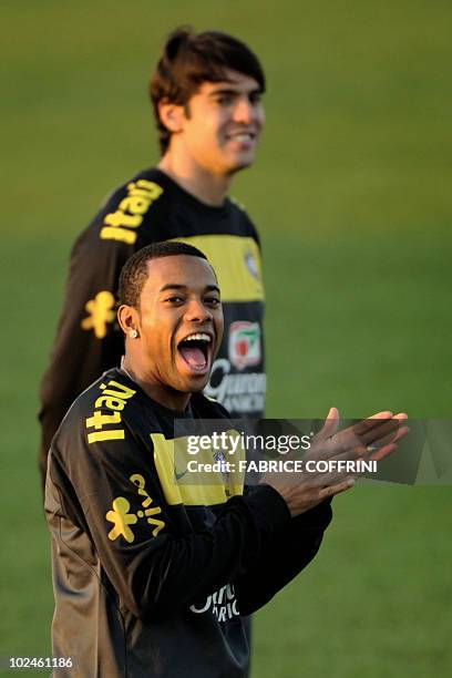 Brazil's striker Robinho and teammate Kaka take part in a training session at Randburg High School in Johannesburg on June 27, 2010 during the 2010...