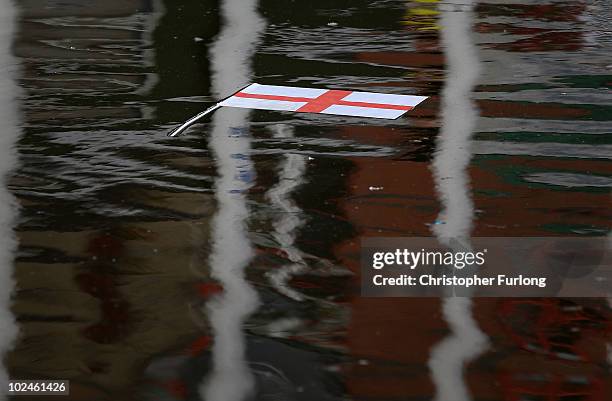 An England flag floats in a Manchester Canal after England lose 4-1 to Germany on June 27, 2010 in Manchester, England. England were knocked out of...