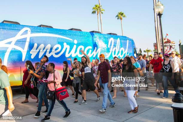 American Idol contestants arrive at the kickoff bus tour auditions at Walt Disney World Resort in Lake Buena Vista, Fla., Aug. 25, 2018. The tour...