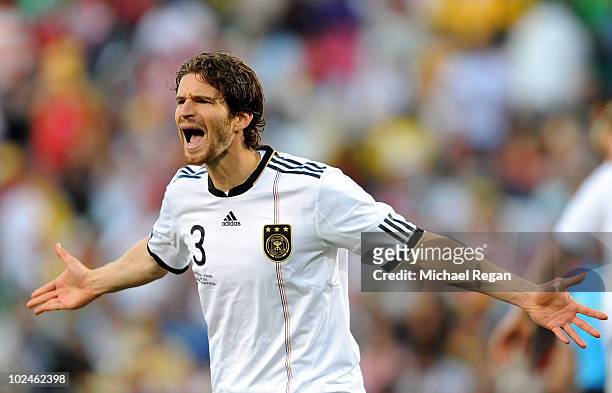 Arne Friedrich of Germany reacts during the 2010 FIFA World Cup South Africa Round of Sixteen match between Germany and England at Free State Stadium...