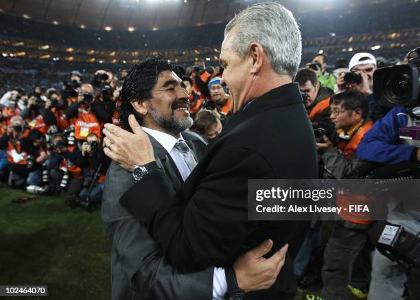 Javier Aguirre head coach of Mexico greets Diego Maradona head coach of Argentina during the 2010 FIFA World Cup South Africa Round of Sixteen match...