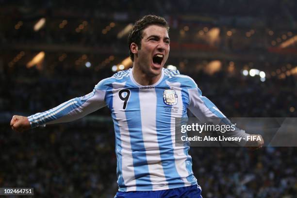 Gonzalo Higuain of Argentina celebrates scoring during the 2010 FIFA World Cup South Africa Round of Sixteen match between Argentina and Mexico at...