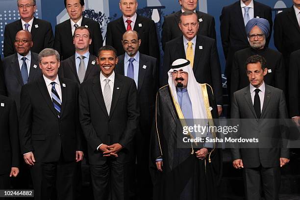 World leaders pose for a group photo during the G20 summit June 27, 2010 in Toronto, Ontario, Canada. The leaders in attendance include U.S....