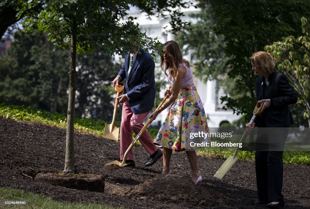 First Lady Tree U.S. First lady Melania Trump, center, plants a sapling from the ...