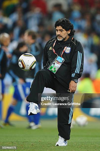 Diego Maradona head coach of Argentina during the warm up session ahead of the 2010 FIFA World Cup South Africa Round of Sixteen match between...
