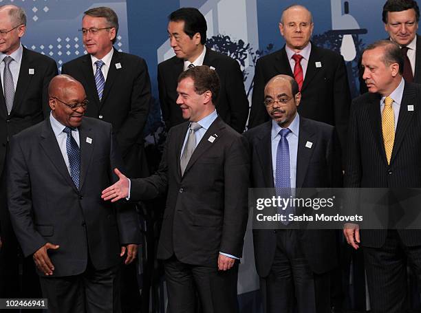 World leaders pose for a group photo during the G20 summit June 27, 2010 in Toronto, Ontario, Canada. The leaders in attendance include U.S....