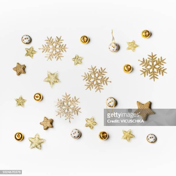 christmas background with gold snowflakes on white - decoration stock-fotos und bilder