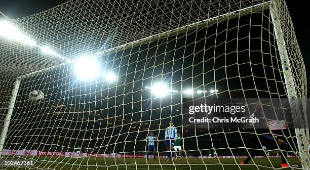 Javier Hernandez of Mexico scores his side's first goal past Sergio Romero of Argentina during the 2010 FIFA World Cup South Africa Round of Sixteen...