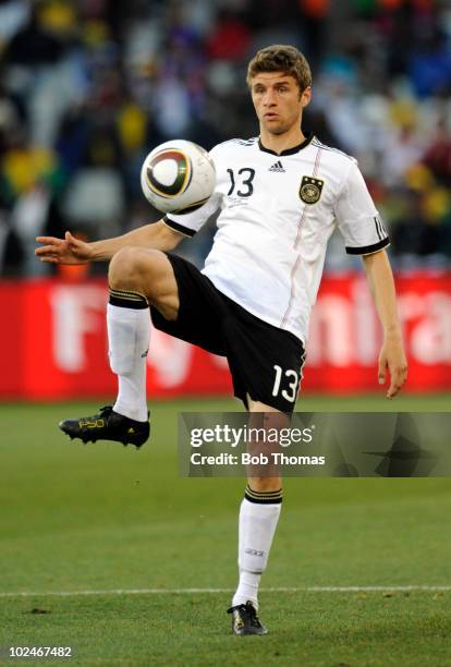 Thomas Mueller of Germany controls the ball during the 2010 FIFA World Cup South Africa Round of Sixteen match between Germany and England at Free...