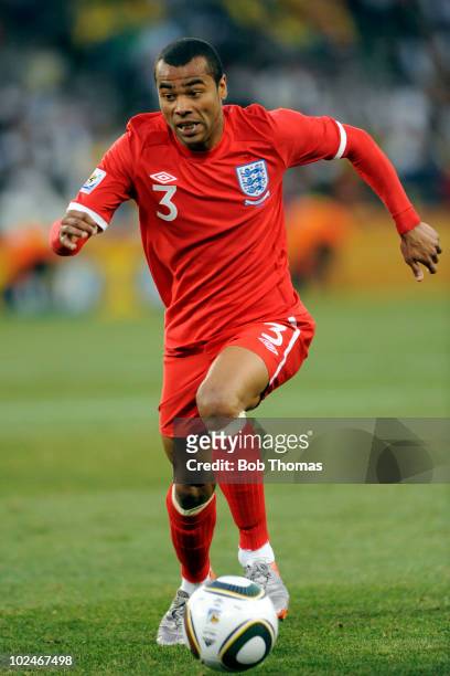 Ashley Cole of England dribbles during the 2010 FIFA World Cup South Africa Round of Sixteen match between Germany and England at Free State Stadium...
