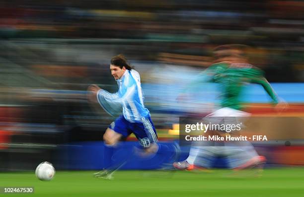 Lionel Messi of Argentina in action during the 2010 FIFA World Cup South Africa Round of Sixteen match between Argentina and Mexico at Soccer City...