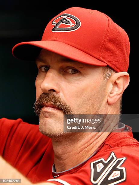 Bench coach Kirk Gibson of the Arizona Diamondbacks watches his team against the Tampa Bay Rays during the game at Tropicana Field on June 27, 2010...