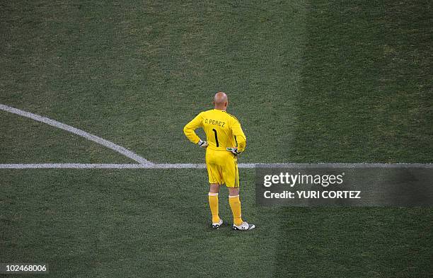 Mexico's goalkeeper Oscar Perez looks dejected after conceding a goal during the 2010 World Cup round of 16 football match Argentina vs. Mexico on...