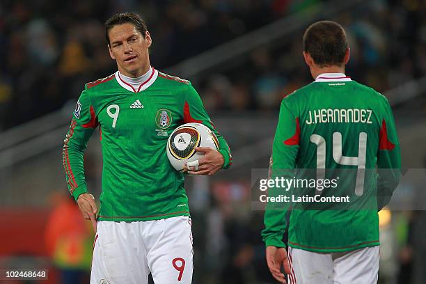 Guillermo Franco and Javier Hernandez of Mexico reacts during the soccer match between Argentina and Mexico as part of 2010 FIFA World Cup at Soccer...