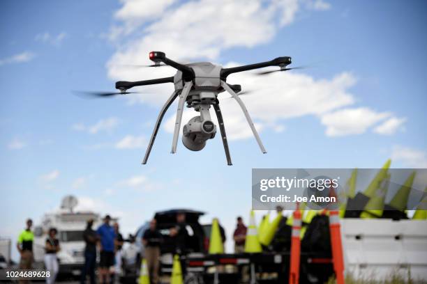 Drew Jurkofsky, a police officer in Fort Collins that also does flight work lifts off during a demonstration of the Aeryon SkyRanger R60 for Colorado...