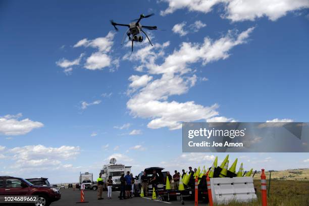Drew Jurkofsky, a police officer in Fort Collins that also does flight work lifts off during a demonstration of the Aeryon SkyRanger R60 for Colorado...