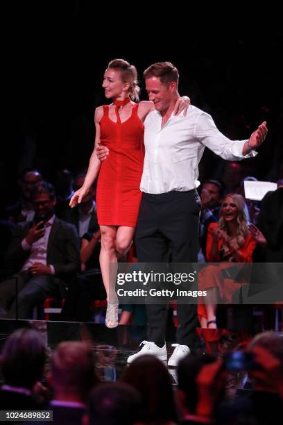 Figure skater Aljona Savchenko and ice hockey player Marcus Kink during the Sport Bild Award on August 27, 2018 in Hamburg, Germany.