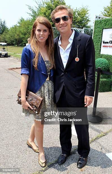 Princess Beatrice and Dave Clark pose for a photograph as they attend the 2010 Veuve Clicquot Manhatten Polo Classic on Governor's Island on June 27,...