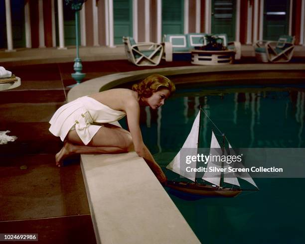 American actress Grace Kelly as Tracy Lord in the musical film 'High Society', 1956.