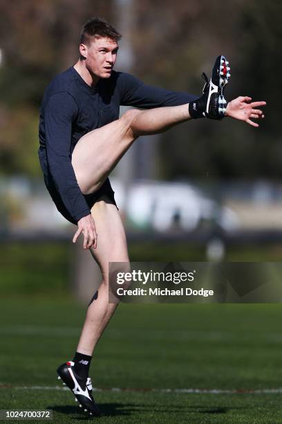 Tom McDonald of the Demons kicks the ball during an optional Melbourne Demons AFL training session at Gosch's Paddock on August 28, 2018 in...