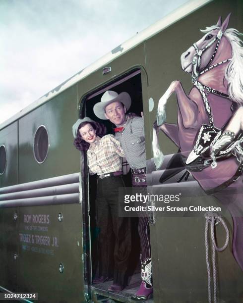 Married actors Roy Rogers and Dale Evans on the Roy Rogers train, circa 1955.