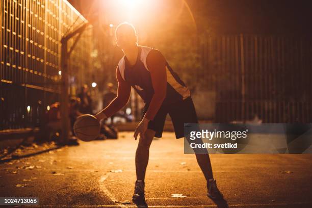 street ball players - one man only stock pictures, royalty-free photos & images