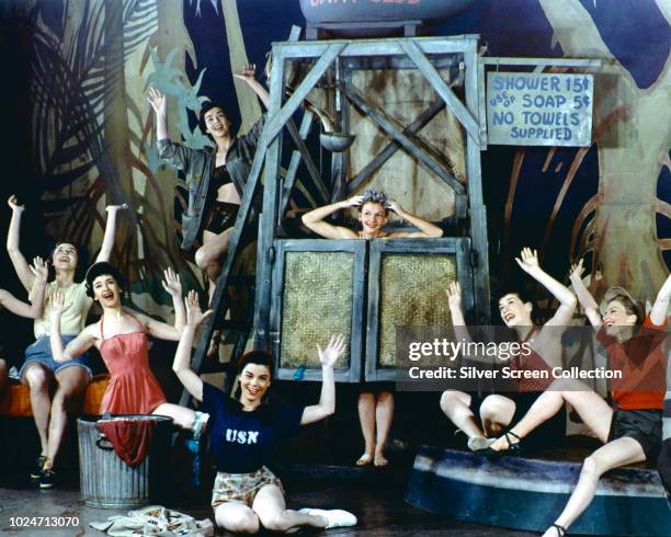 American actress and singer Mary Martin takes a shower in a scene from the Broadway musical 'South Pacific', 1949.