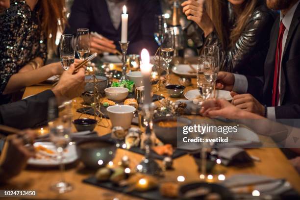 new year celebration - new year's eve dinner stock pictures, royalty-free photos & images