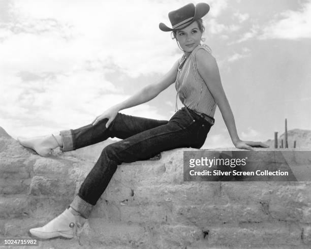 American actress Angie Dickinson during the filming of the western 'Rio Bravo' in Arizona, 1959.