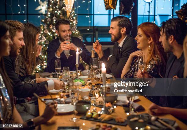 new year dinner party - glamour stock pictures, royalty-free photos & images
