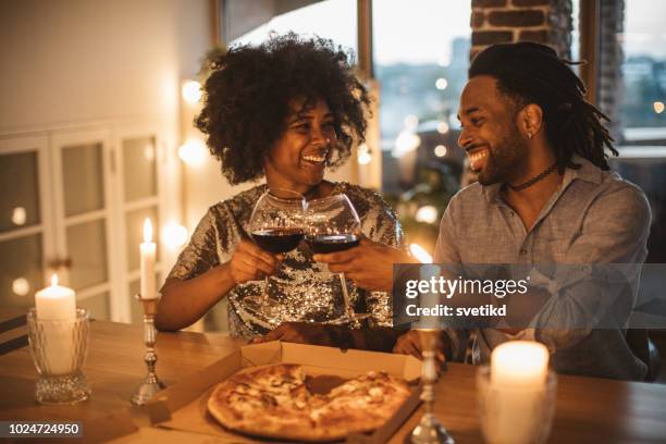 romantic pizza evening at home - date night stock pictures, royalty-free photos & images