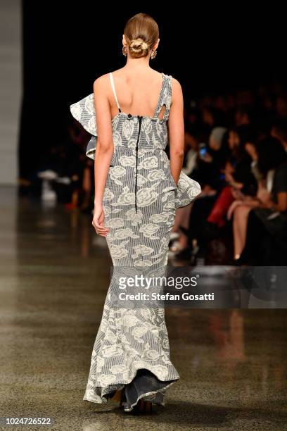 Model walks the runway in a design by Cecilia Kang Couture during the New Generation Emerging Couture show during New Zealand Fashion Week 2018 at...