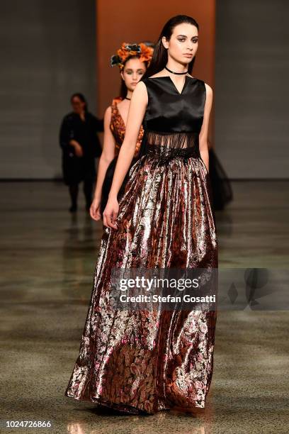 Model walks the runway in a design by Ruscoe during the New Generation Emerging Couture show during New Zealand Fashion Week 2018 at Viaduct Events...