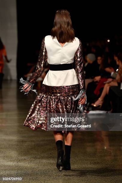 Model walks the runway in a design by Ruscoe during the New Generation Emerging Couture show during New Zealand Fashion Week 2018 at Viaduct Events...