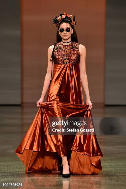 Model walks the runway in a design by Ruscoe during the New Generation Emerging Couture show during New Zealand Fashion Week 2018 at Viaduct Events...