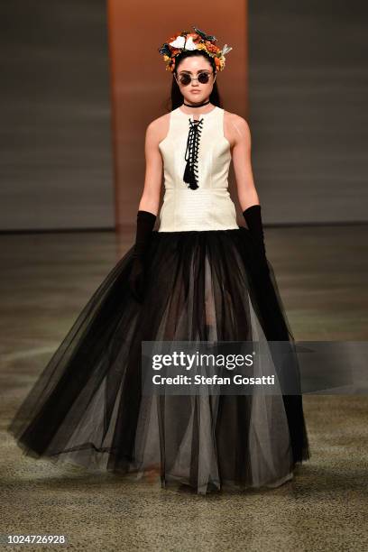 Model walks the runway in a design by Ruscoe during the New Generation Emerging Couture show during New Zealand Fashion Week 2018 at Viaduct Events...