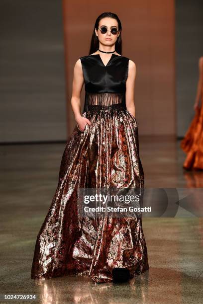 Model walks the runway in a design by Ruscoe during the New Generation Emerging Couture show during New Zealand Fashion Week 2018 at Viaduct Events...