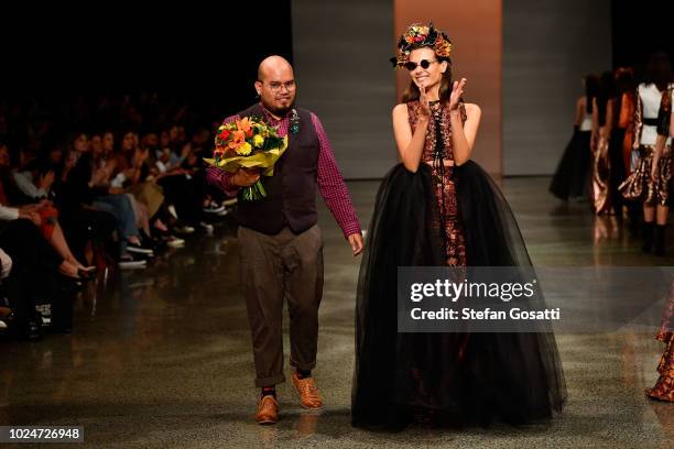 Designer Ruscoe Bustenera-Kirby thanks the audience following the Ruscoe runway during the New Generation Emerging Couture show during New Zealand...