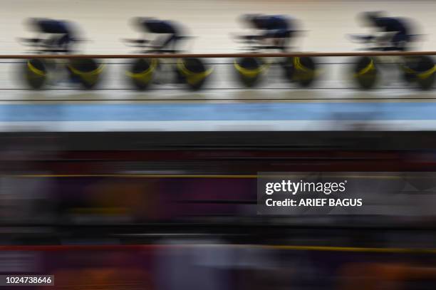 Malaysia's Mohamad Nur Aiman Mohd Zariff, Muhamad Afiq Huznie Othman, Irwandie Lakasek and Muhammad Nur Aiman Rosli compete in the men's team pursuit...