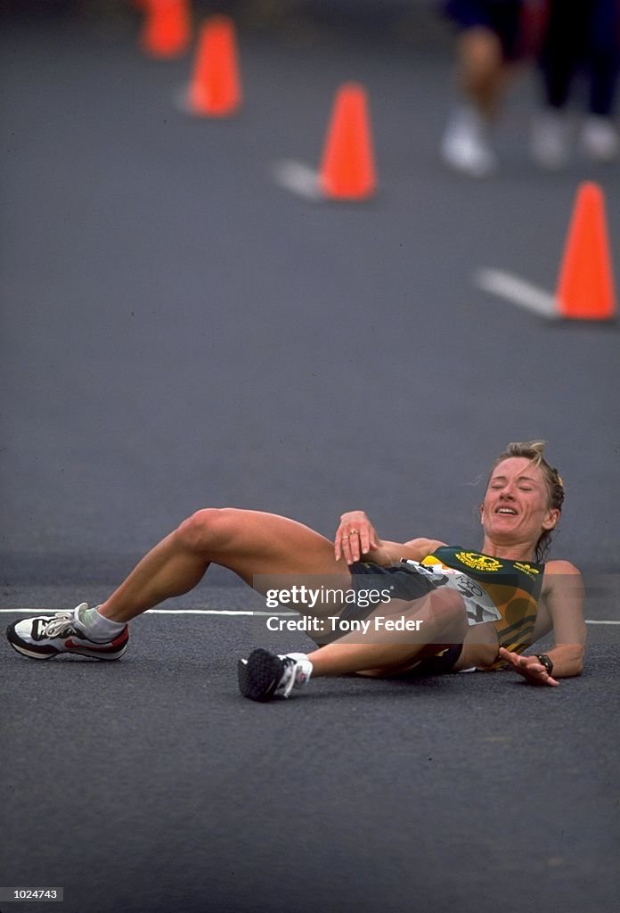 Ronie Reece Ruckle Tani Ruckle of Australia collapses due to exhaustion in the womens ...