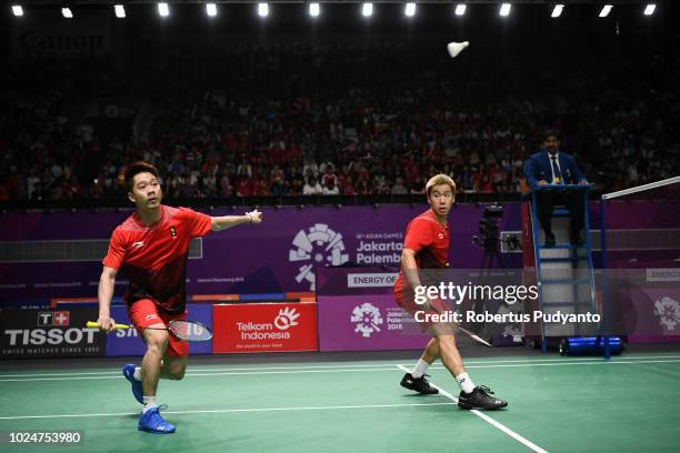 Marcus Fernaldi Gideon and Kevin Sanjaya Sukamuljo of Indonesia compete against Fajar Alfian and Muhammad Rian Ardianto of Indonesia during MenÕs...