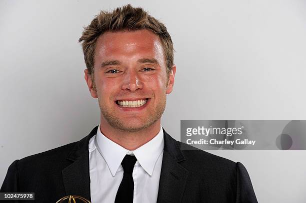 Actor Billy Miller poses with the Outstanding Supporting Actor Award at the 37th Annual Daytime Entertainment Emmy Awards held at the Las Vegas...