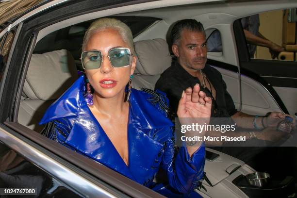 Singer Lady Gaga and Christian Carino are seen leaving their hotel on August 28, 2018 in Paris, France.