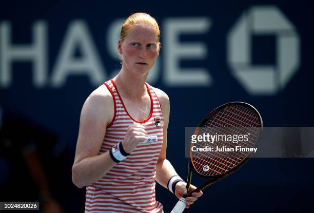 Alison Van Uytvanck of Belgium celebrates the point during her women's singles first round match against Lesia Tsurenko of Ukraine on Day Two of the...