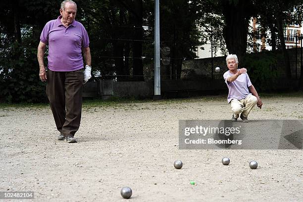 Andre Demoinerie, left, and Albert Manthe play petanque in a park in Paris, France, on Saturday, June 26, 2010. France's plan to lift its retirement...