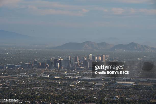 View of the downtown Phoenix, Arizona city skyline as seen from South Mountain Park, August 28, 2018.