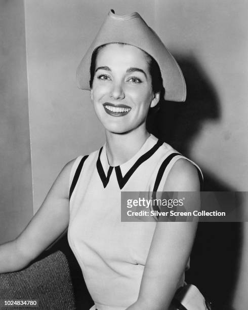 American actress Julie Adams wearing a tricorn-style hat, 1954.